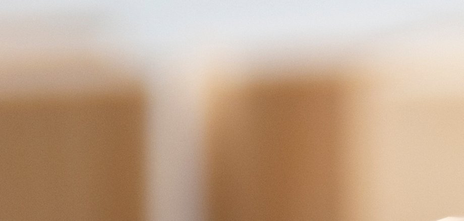 four wooden blocks with the letters info on the bright surface of a gray table, business concept Vier Würfel mit den Buchstaben I N F O