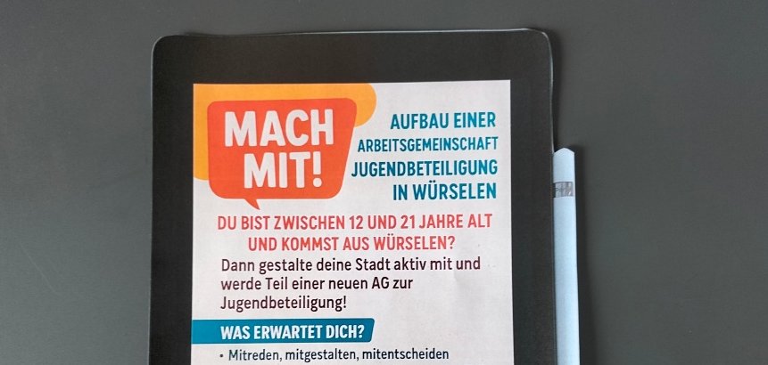 Ein Plakat auf einem gebastelten Tablet